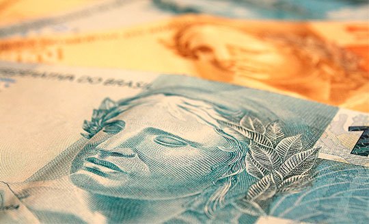 Mercado avalia que a economia brasileira deve encolher em 2015